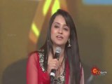 Trisha receiving 10 years of Excellence award at SIIMA 2013
