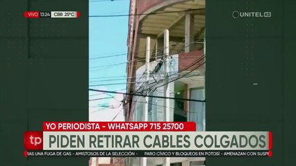 Piden a empresa de electricidad recoger cables que dejaron colgados tras sacar poste de luz